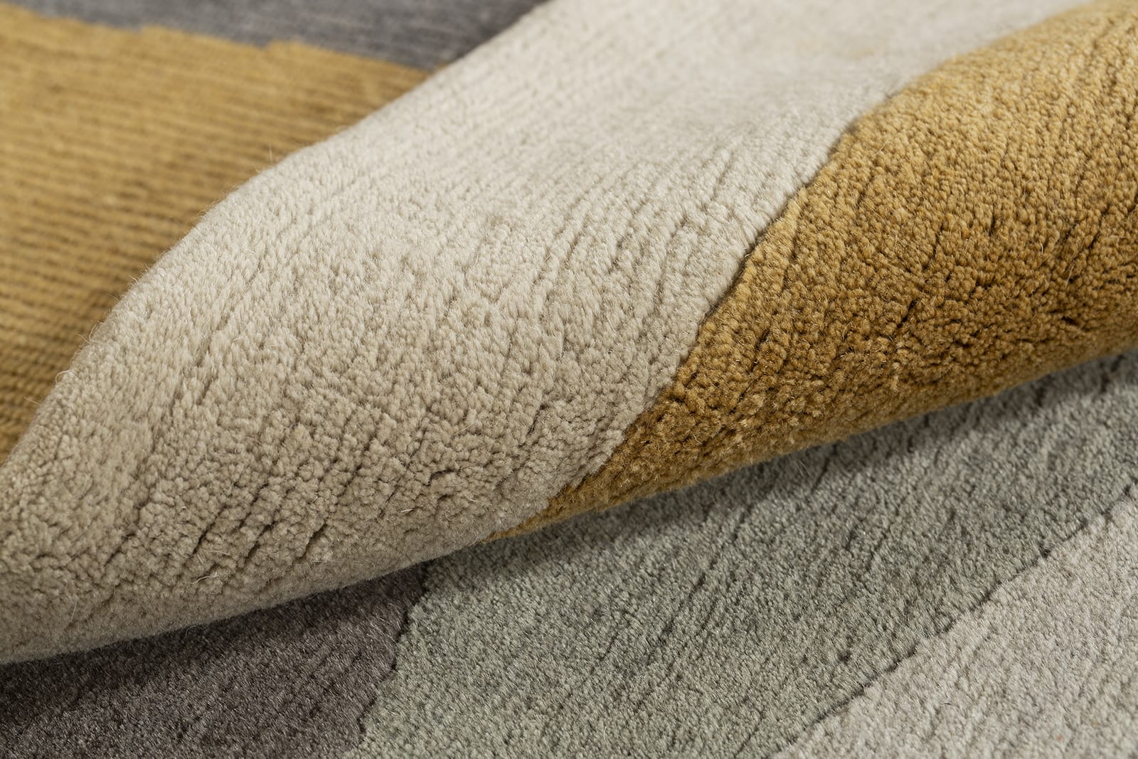 detail image of Crystal Yellow Grey hand knotted area rug design by Tufenkian