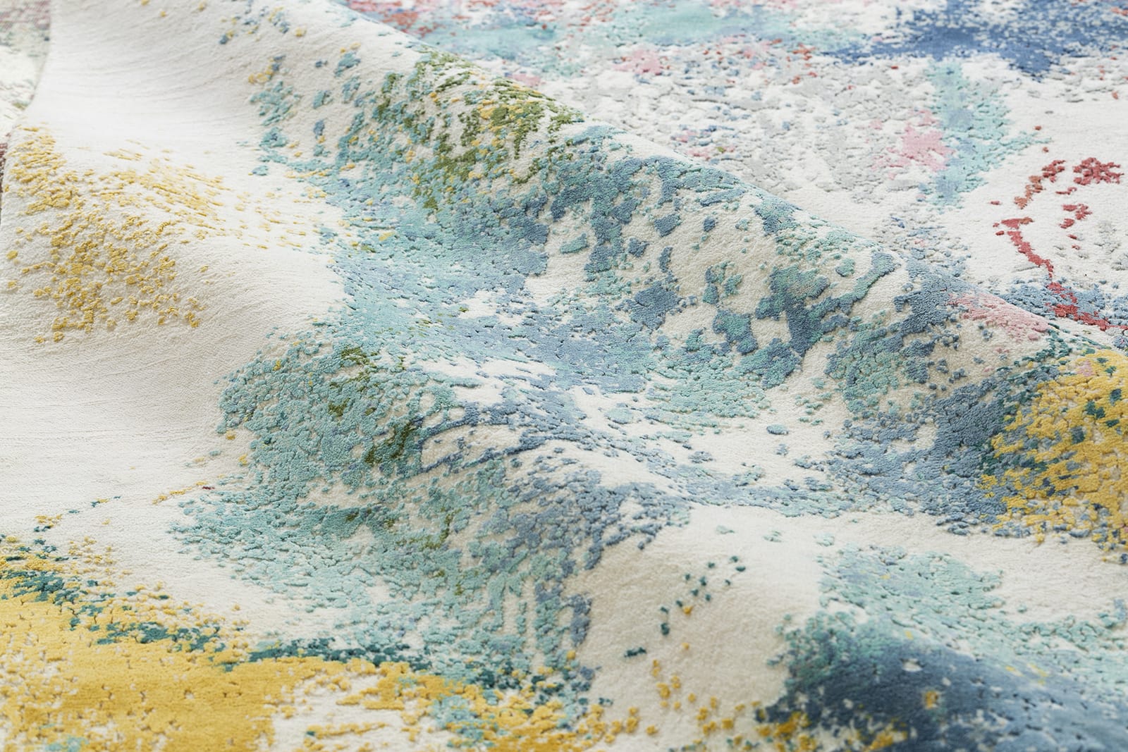 detail image of Haven Carnival hand knotted area rug design by Tufenkian