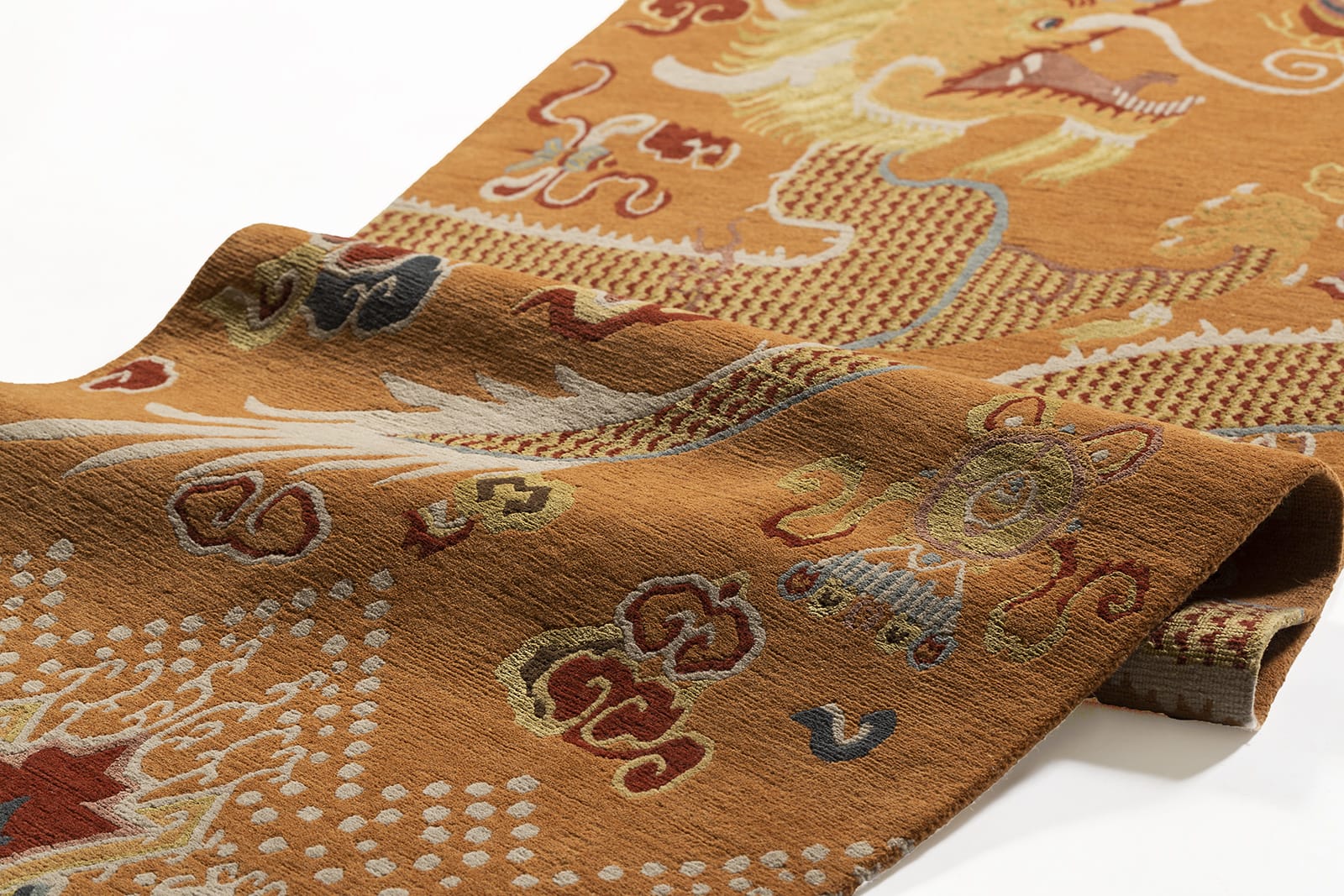 detail image of Imperial Dragon Orange hand knotted area rug design by Tufenkian