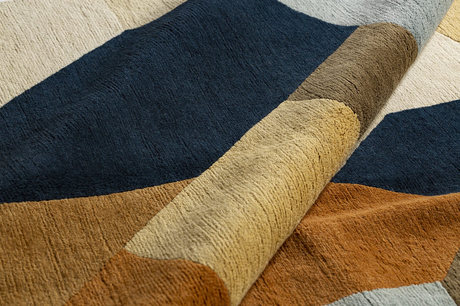 detail image of Kaleidoscope Denim hand knotted area rug design by Tufenkian