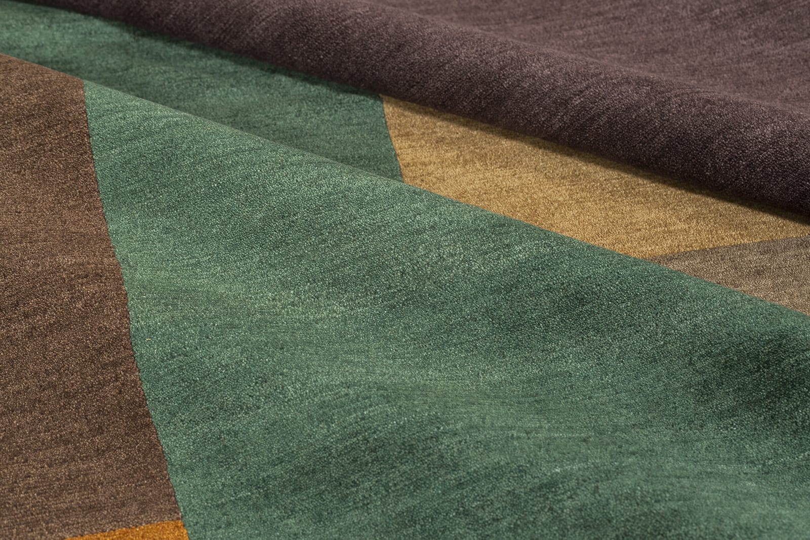 detail image of Monolith Pine hand knotted area rug design by Tufenkian