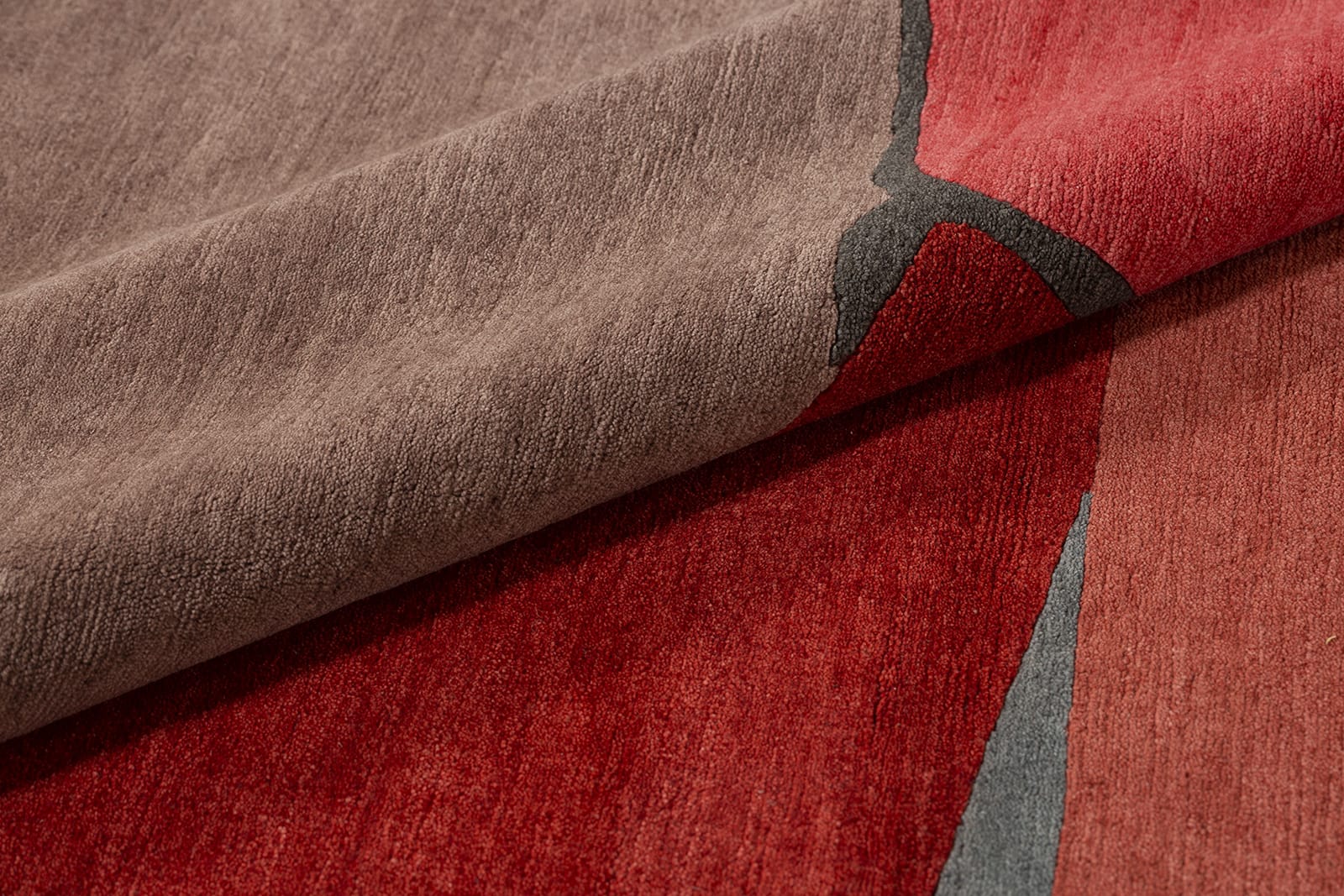 detail image of Palisade Red hand knotted area rug design by Tufenkian