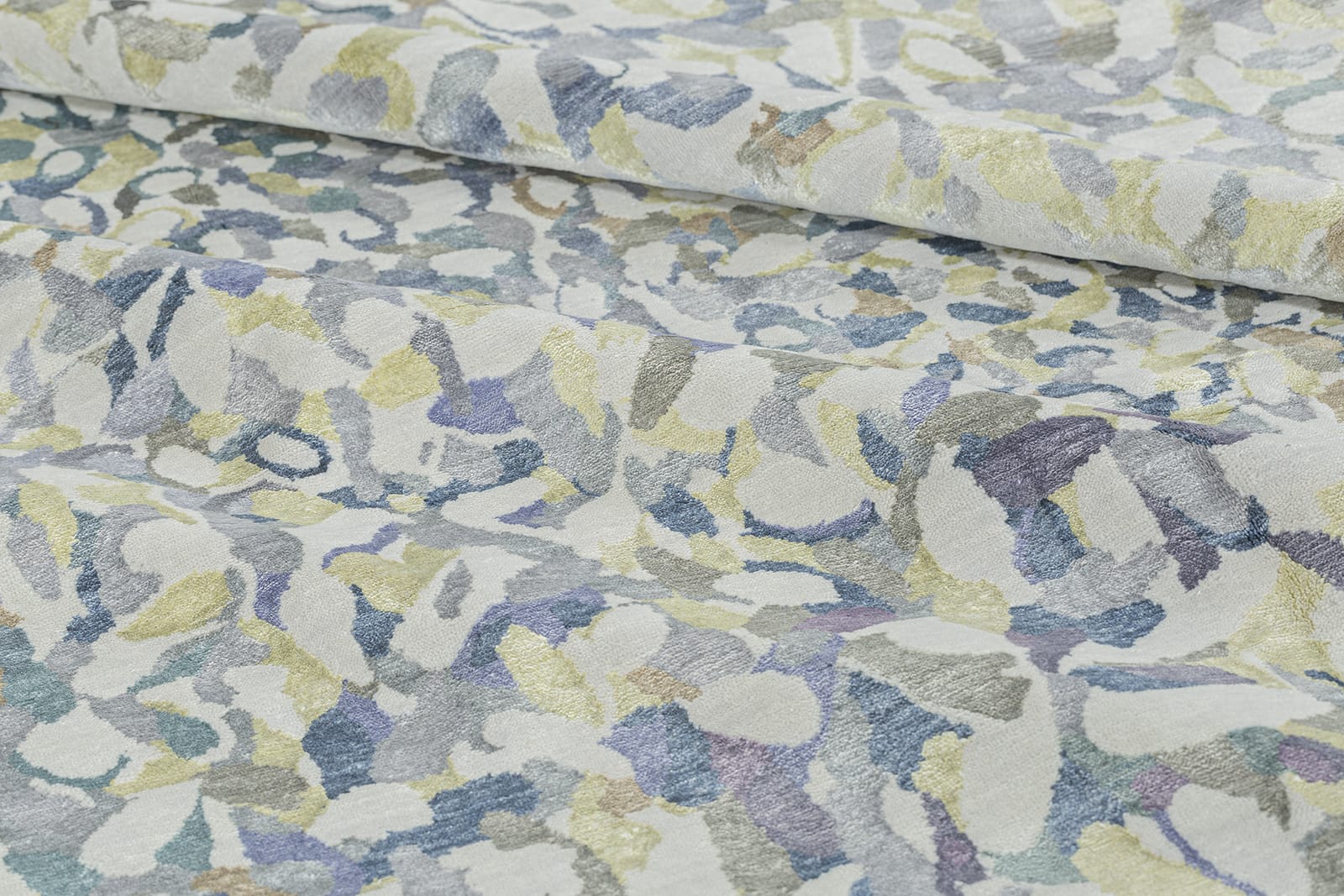 detail image of Petals Confetti hand knotted area rug design by Tufenkian