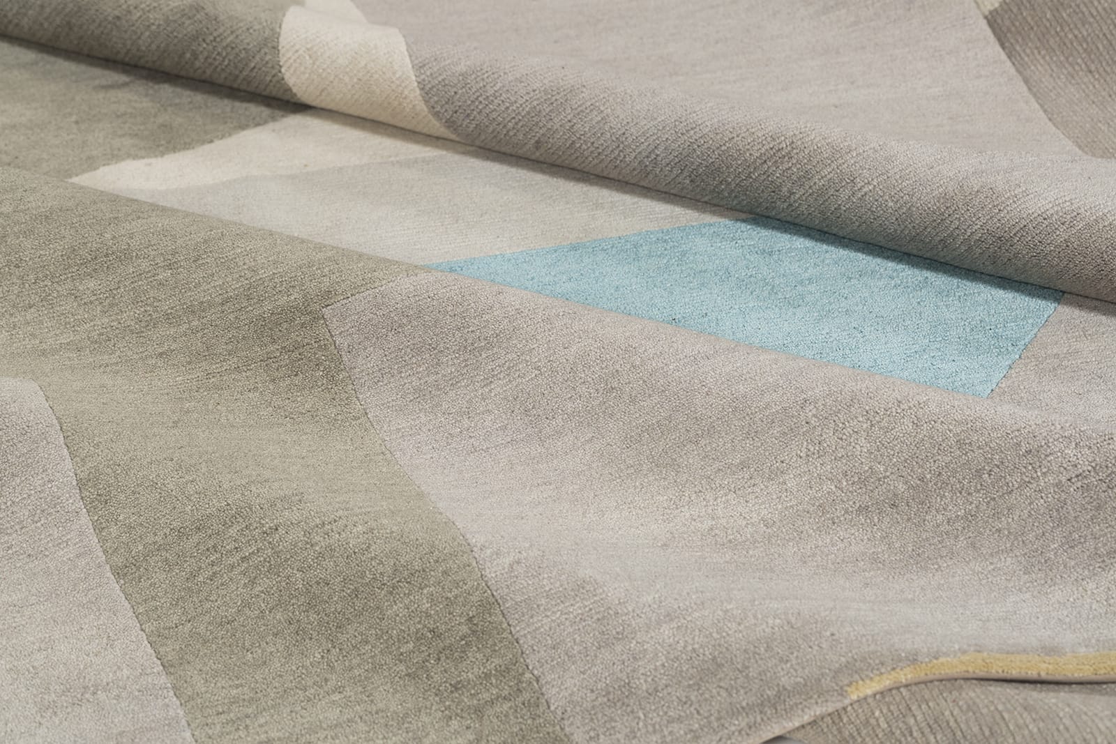 detail image of Turnstile Grey hand knotted area rug design by Tufenkian