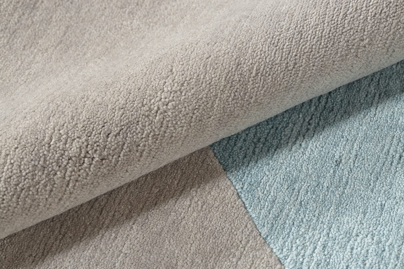 detail image of Turnstile Grey hand knotted area rug design by Tufenkian