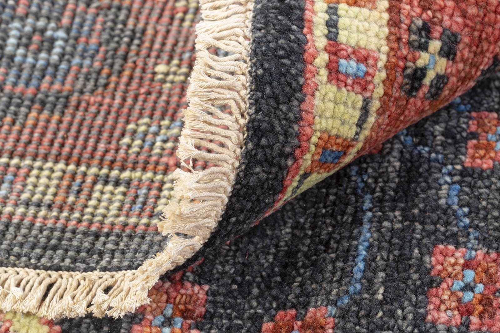 detail image of Donegal III Fiesta hand knotted area rug design by Tufenkian