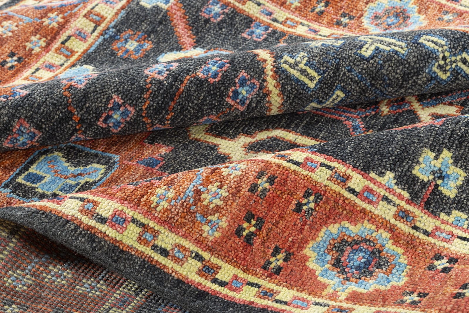 detail image of Donegal III Fiesta hand knotted area rug design by Tufenkian