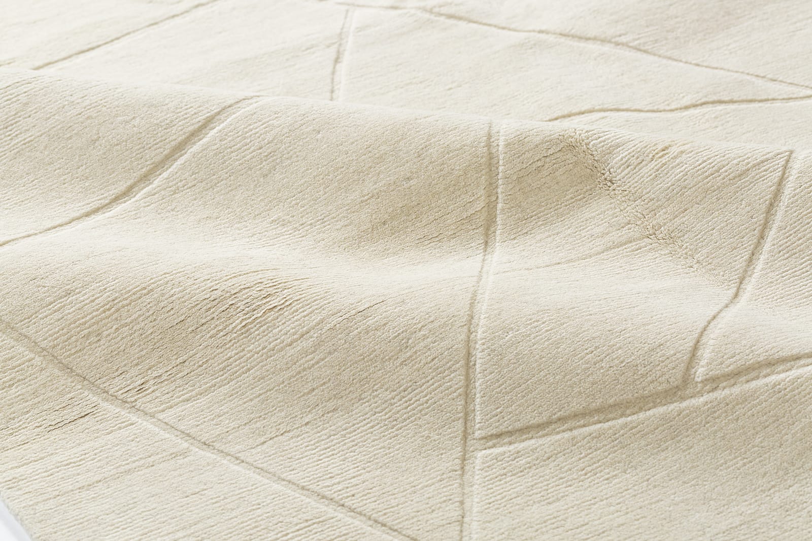 detail image of Fractal White hand knotted area rug design by Tufenkian