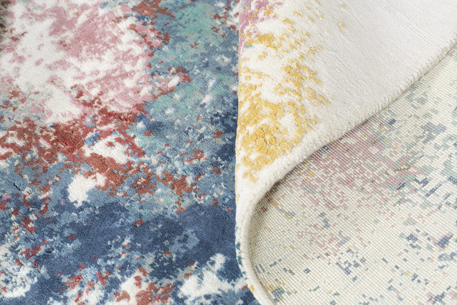 detail image of Haven Carnival hand knotted area rug design by Tufenkian