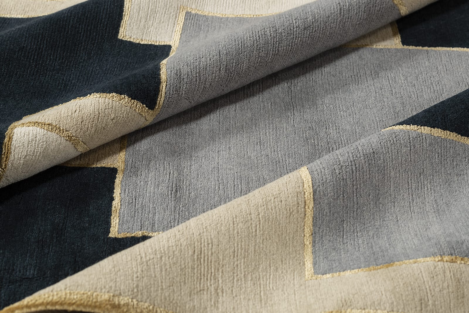 detail image of Knossos II Gold hand knotted area rug design by Tufenkian