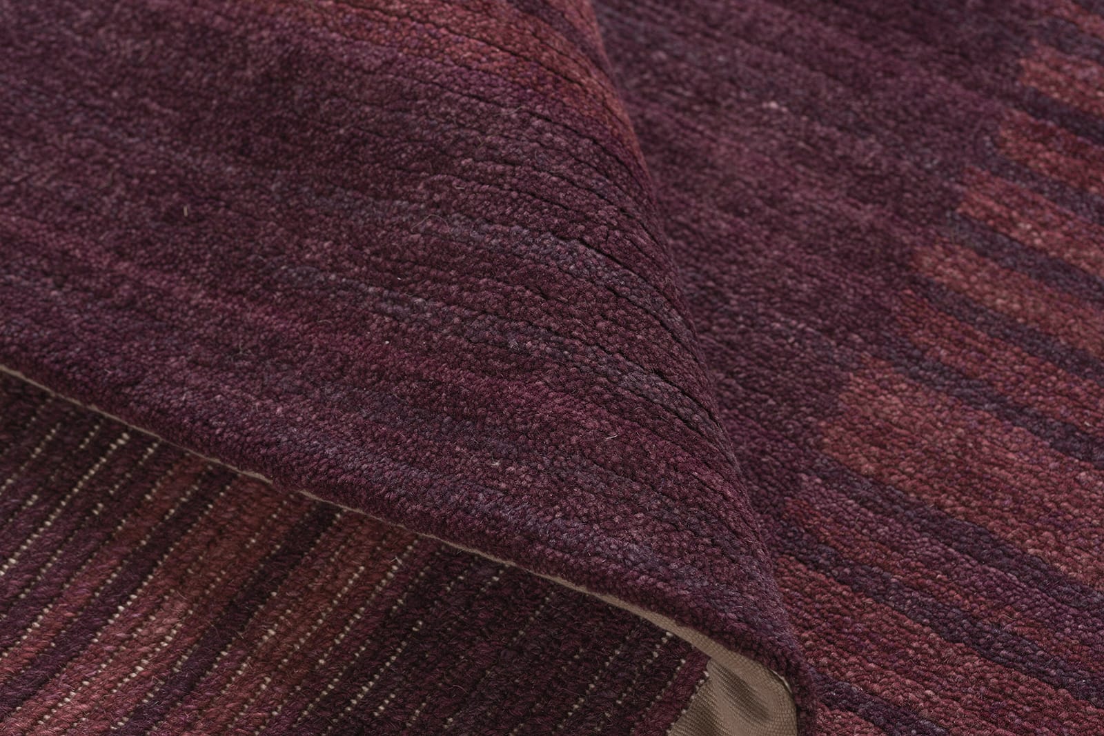detail image of Serenity Plum hand knotted area rug design by Tufenkian