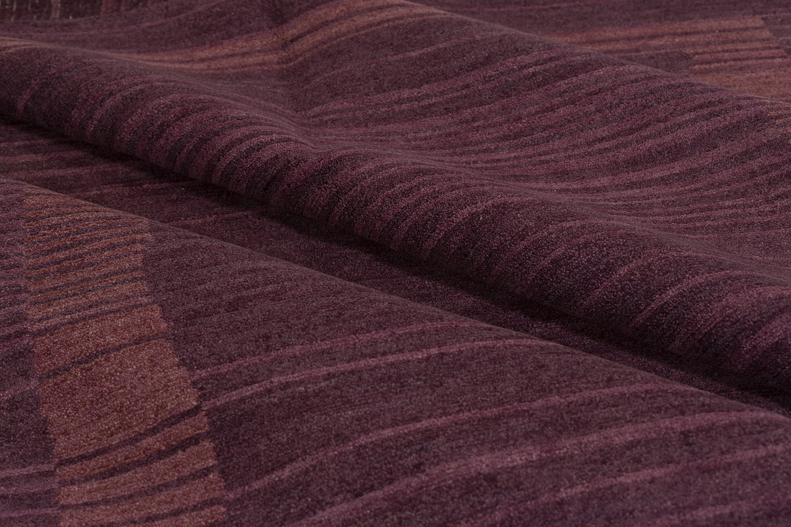 detail image of Serenity Plum hand knotted area rug design by Tufenkian