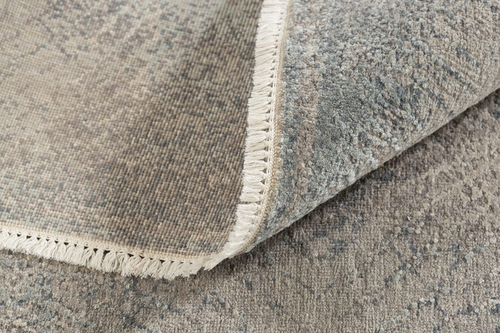 detail image of Stardust Grey Blue hand knotted area rug design by Tufenkian