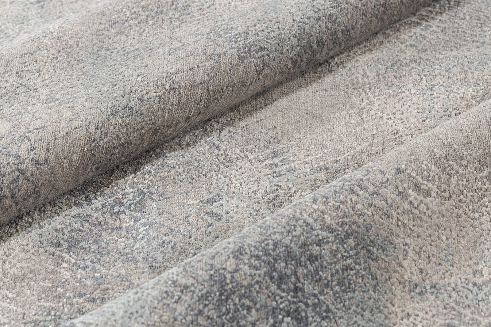 detail image of Stardust Grey Blue hand knotted area rug design by Tufenkian