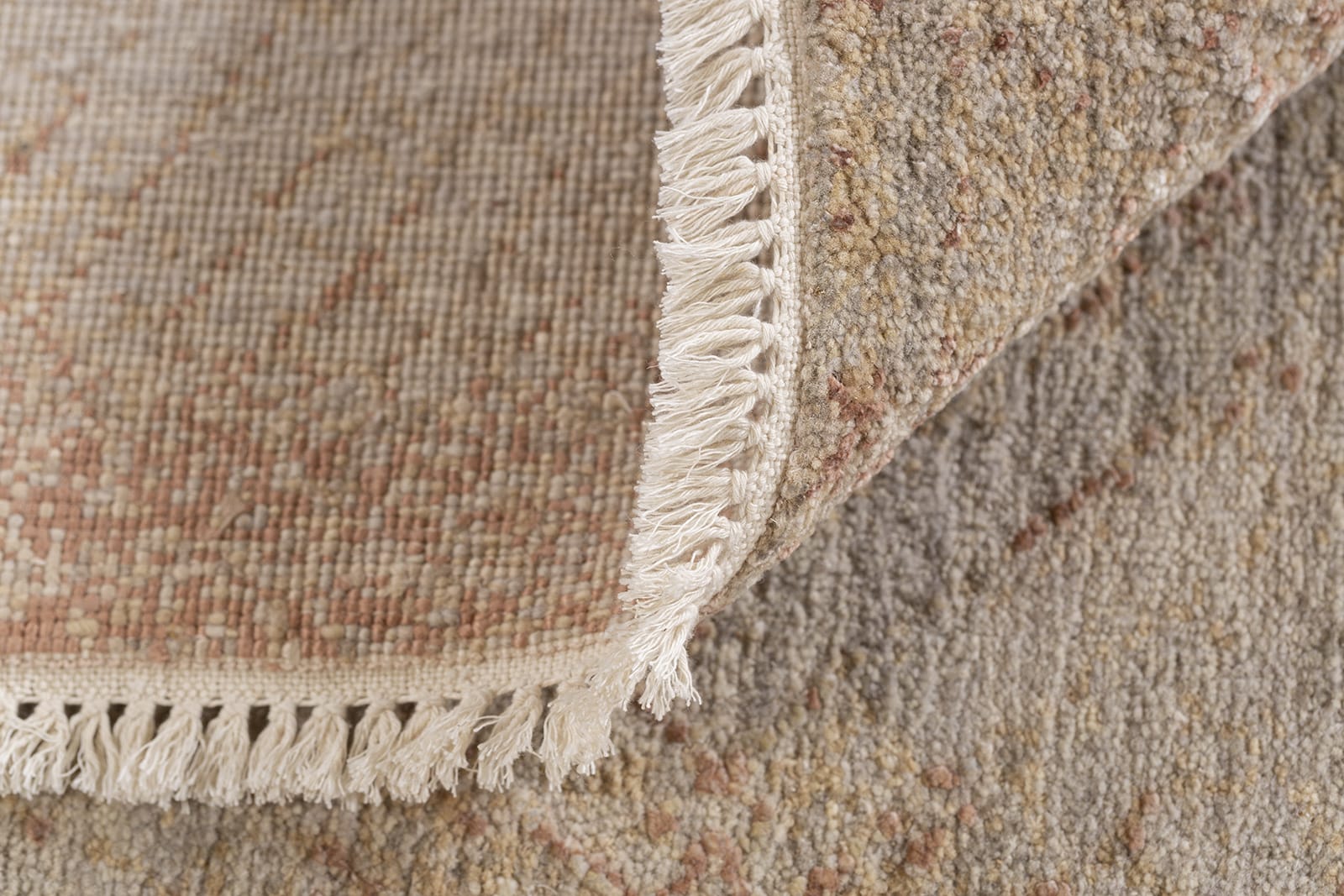 detail image of Stardust Rust hand knotted area rug design by Tufenkian