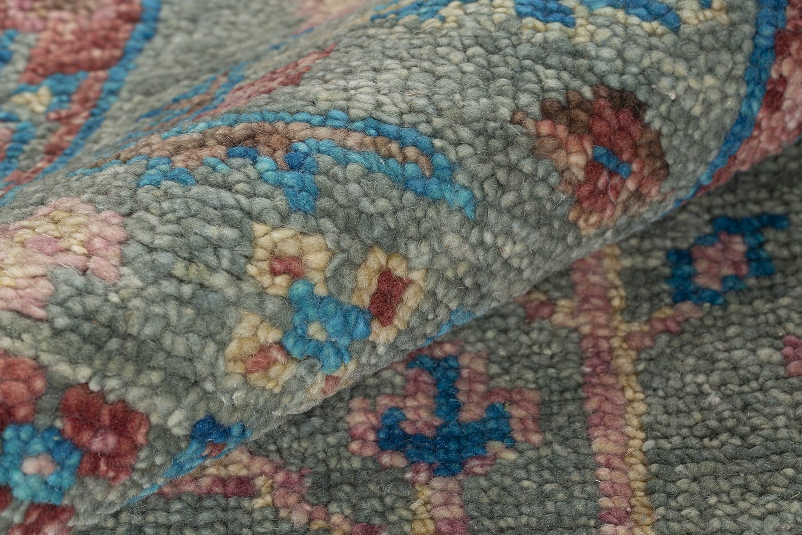 detail of Tigranakert Dusty Rose hand knotted area rug