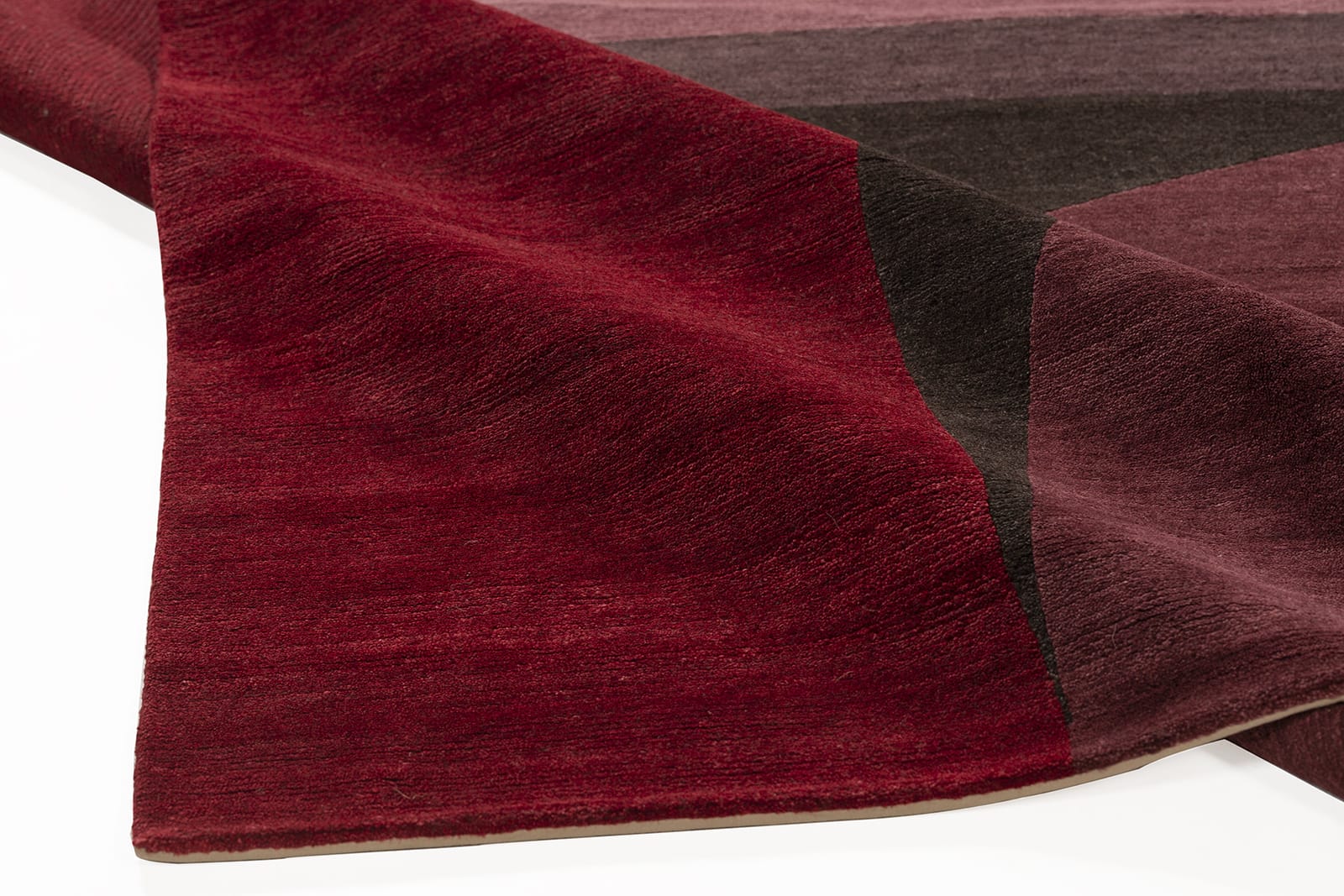 detail image of Turnstile Merlot hand knotted area rug design by Tufenkian