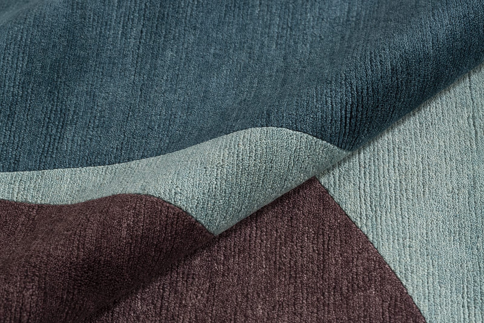 detail image of Turnstile Teal hand knotted area rug design by Tufenkian